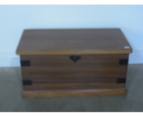 A pine metal bound trunk with hinged lid - 87cm x 43cm x 43cm high