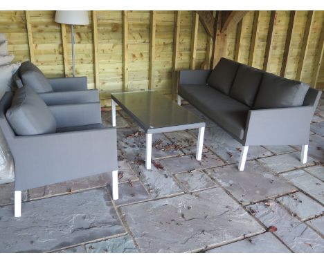 A new ex display Life all weather garden sofa with two armchairs and a coffee table