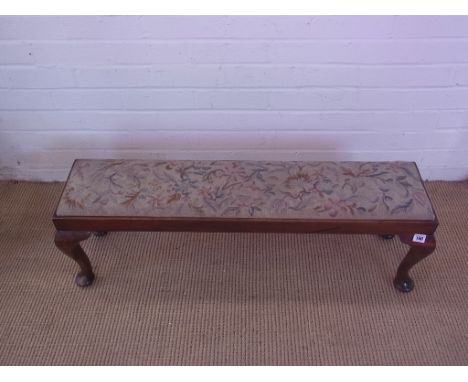 An oak footstool on cabriole legs tapestry seat 