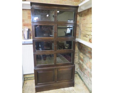 A Baker & Co Oxford oak sectional bookcase in the Globe Wernicke style - 176cm x 88cm x 28cm