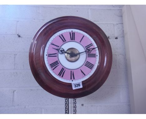 A Black Forest alarm wall clock, pink and white enamelled dial with two weights - Width 28cm 