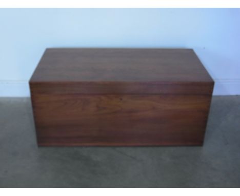A large teak trunk with hinged lid - 106.5cm x 55cm x 47cm