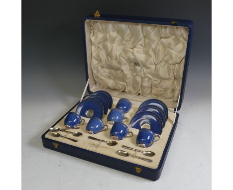 A boxed Royal Worcester six place Coffee Set, comprising six Coffee Cans, one handle missing, and Saucers, decorated in powde