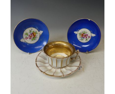 A fine Continental lithophane porcelain Cup and Saucer, gilded interior with lithophane cameo to bottom of cup, together with
