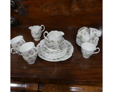 A Susie Cooper 'Wild Strawberry' pattern Coffee Set, comprising eight Coffee Cups and six Saucers, six Bread Plates, one Cake