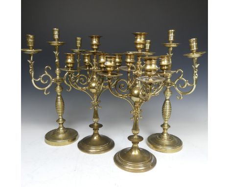 A pair of Antique brass five-light Candelabra, with scroll arms, H 39.5 cm, together with a similar pair of three-light brass