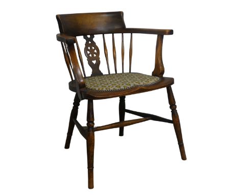 A vintage desk Chair, with pierced wheel splat back and turned spindles, above upholstered shaped seat and turned supports, W