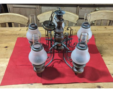 A mahogany and gilt metal five light Chandelier, with baluster shaped stem and frosted glass shades, H 56 cm. 