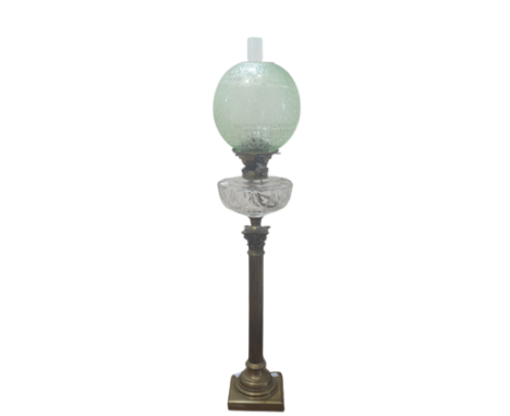 A large late 19thC Oil Lamp, with cut glass font on brass Corinthian column base, with green acid etched shade, marks for Hin