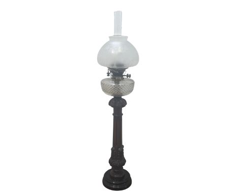 A late 19thC large Oil Lamp, with cut glass font on turned wooden column, marks for Hinks Duplex burner, with acid etched sha