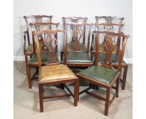 A Set of eight Chippendale style mahogany Dining Chairs, with shaped top rails above green leather upholstered seats, raised 