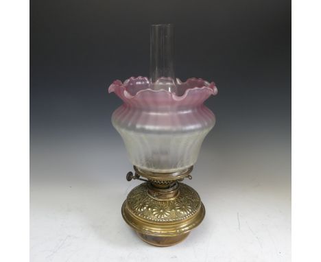 A 19thC oil Lamp, with Art Nouveau style shade, Everard and Co burner, glass font with embossed brass top, Duplex Burner H 41