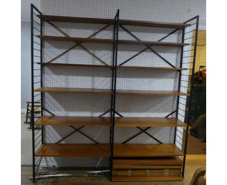 A vintage Ladderax two sectioned shelving Unit,&nbsp;black painted metal frame with twelve shelves, with lots of spare shelve