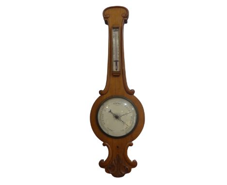 An Early 20th century oak cased Barometer, the white face inscribed 'Storm - Rain - Change - Fair - Very Dry', together with 