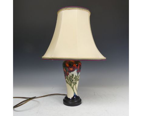 A Moorcroft 'Poppy' pattern Lamp Base, tubelined in typical style with corresponding shade, H 44cm with shade. 