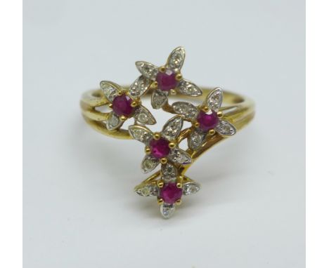 A 9ct gold, diamond and ruby ring, 2.9g, T 