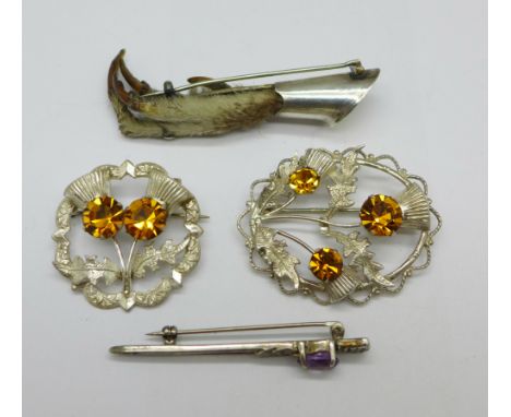 Four silver Celtic brooches 