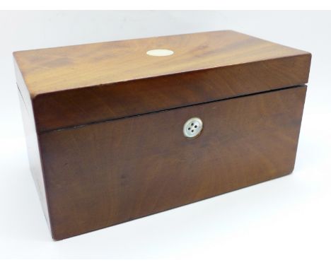 A Georgian walnut tea caddy with mother of pearl inlay (one inlay replaced with button) 