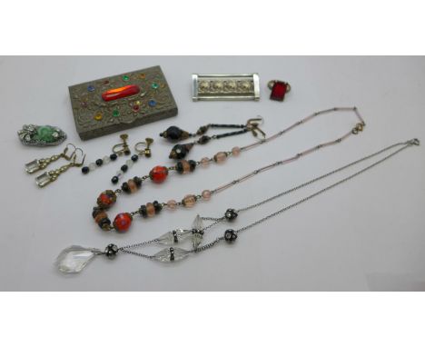 A collection of Art Deco jewellery including necklaces, earrings, brooch, etc., and a gem set box 