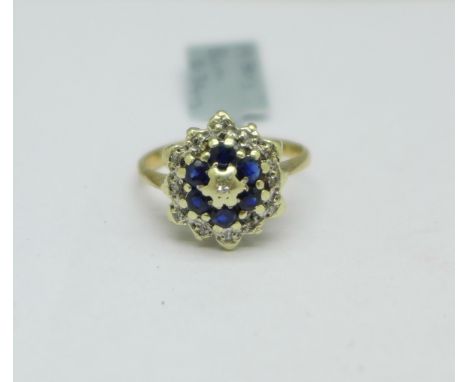A 9ct gold, diamond and sapphire cluster ring, 2.3g, K 