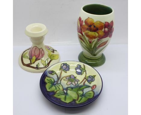 Three pieces of Moorcroft; small vase, dwarf candlestick and small dish 