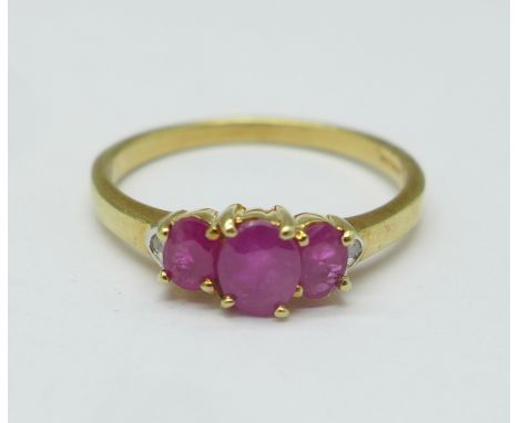 A 9ct gold, diamond and ruby ring, 1.9g, N 