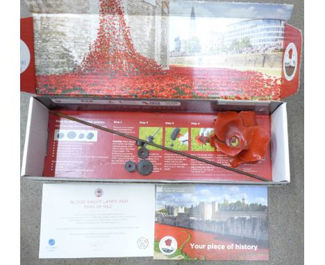 A Paul Cummins Ceramics ceramic poppy, Tower of London installation 2014 World War I centenary, with certificate, boxed 