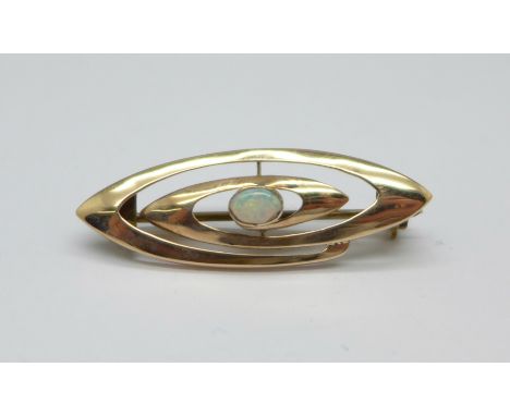 A Murrle Bennett 9ct gold brooch with central opal, marked '9c MB &amp; Co.' on lozenge, 2.6g, metal pin, 37mm 