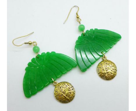 A pair of silver gilt and jade earrings 