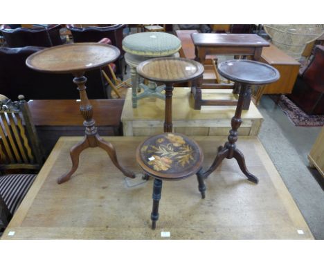 Three mahogany tripod wine tables and a pokerwork stool 