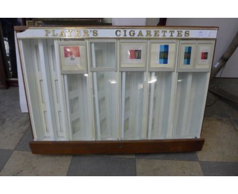 A vintage Players Cigarette's dispensing machine 