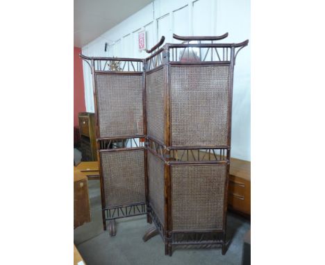 A faux bamboo bergere three panel folding screen 