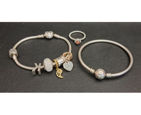 SELECTION OF SILVER PANDORA JEWELLERYcomprising a Moments Heart clasp charm bracelet with five charms and two clips; a Moment