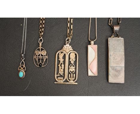 FIVE SILVER AND SILVER MOUNTED PENDANTS ON CHAINScomprising one by Malcolm Gray for Ortak, an Egyptian double cartouche desig