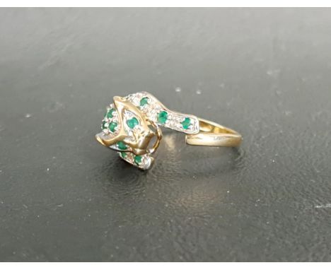 DIAMOND AND EMERALD SET CARTIER STYLE PANTHER RINGthe panther with pave set diamond and emeralds, in nine carat gold, ring si