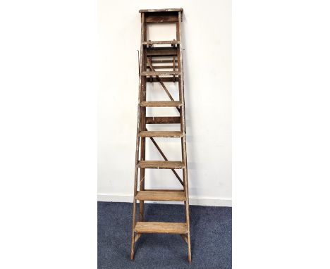 OLD SET OF WOODEN FOLDING STEP LADDERSpaint splattered, with seven steps to platform 218cm high