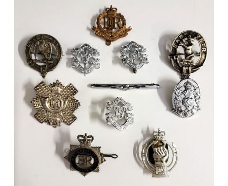 COLLECTION OF ELEVEN MILITARY CAP BADGES AND OTHERincluding 5th Seaforth Highlanders; Highland Light Infantry; Royal Armoured