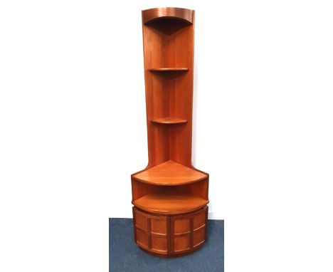 VINTAGE NATHAN MID-CENTURY TEAK CORNER CABINETwith two smaller shelves to the top and two larger shelves toward the bottom, a