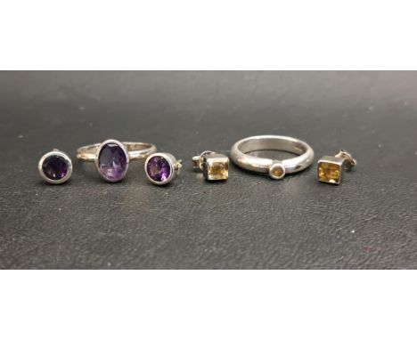 TWO GEM SET RINGS AND MATCHING STUD EARRINGScomprising an oval cut amethyst set ring measuring approximately 1.5cts, ring siz