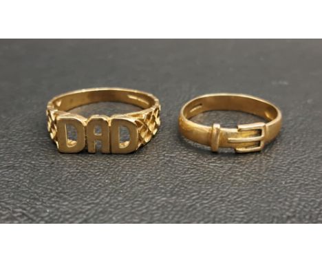 TWO NINE CARAT GOLD RINGSone a buckle design ring and the other with the name 'DAD', ring sizes M and U respectively, total w