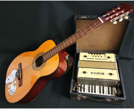 HOHNER SIGNORINA GROSSI ACCORDIANwith mother of pearl style finish, in black case; together with acoustic Japanese guitar 'An
