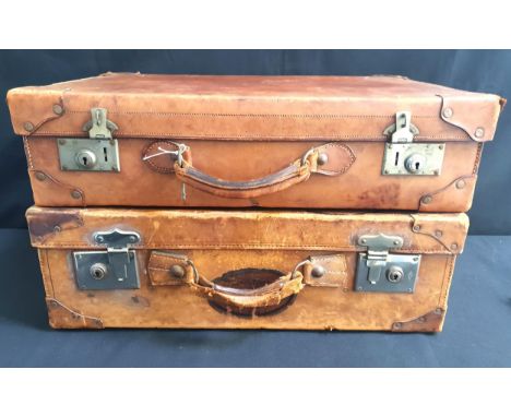 TWO VINTAGE LEATHER SUITCASSESboth with reinforced corners, one with internal straps and satchel compartment, the other with 