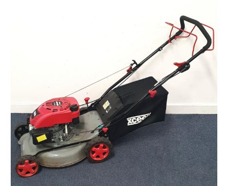 XCEED PETROL LAWN MOWER model number EX46SLM, with 139cc 4-stroke engine and 46cm blade, with collection bag