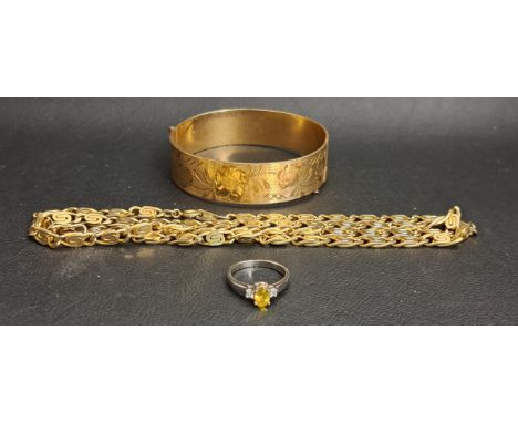 NINE CARAT GOLLED GOLD BANGLEwith engraved floral decoration and a safety chain; together with an eighteen carat gold plated 