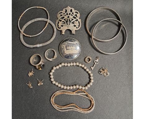 SELECTION OF SILVER JEWELLERYincluding five unmarked silver bead bracelets, two bangles, a cabochon stone set dress ring, a t