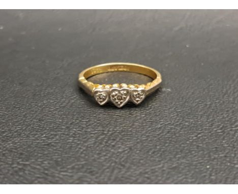 DIAMOND THREE STONE RINGthe illusion set diamonds on eighteen carat gold shank with platinum setting, ring size M and approxi