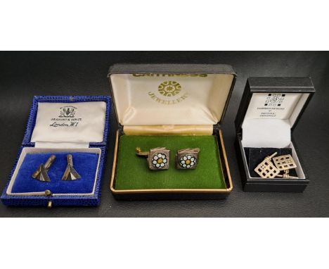 THREE PAIRS OF SILVER CUFFLINKScomprising a Caithness pair set with millefiori cabochons; a pierced Mackintosh style pair, an