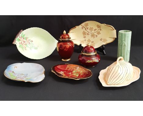 QUANTITY OF CARLTON WAREincluding two Rouge Royal ginger jars with lids, cabbage footed bowl, butter dish, lilac dish with gi