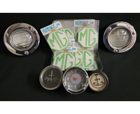 SELECTION OF AUTOMOTIVE INTEREST ITEMScomprising two classic Lucas domed headlamps; two gauges; smiths car clock; and eleven 