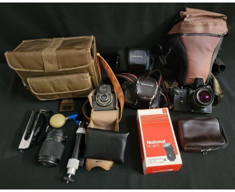 SELECTION OF CAMERAS AND CAMERA EQUIPMENTincluding Zenit 12 XP camera; Fujica ST605N camera; Olympus OM-1n camera; Ensign Ful